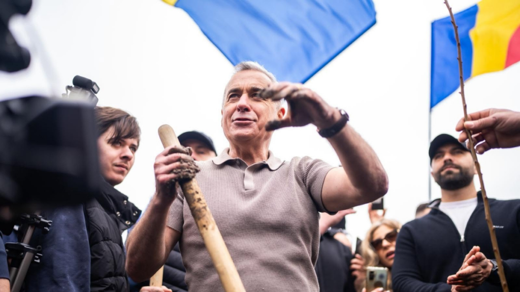 Cu Jaguarul până la piața de vechituri: Georgescu spune că nu e în campanie, ci „într-o lucrare”